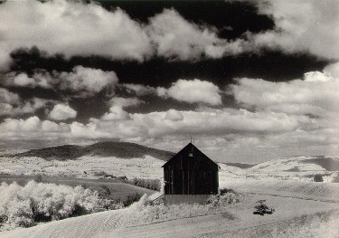 barn and clouds